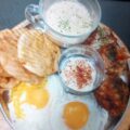 Egg, puri, jehlab, meat paratha, tahini